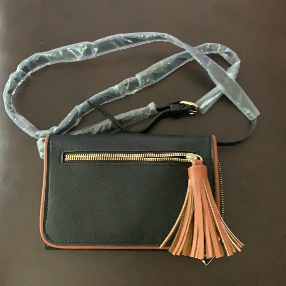 👜 HOST PICK👛 NWT Black and Brown Crossbody Bag. Flap/snap closure.
